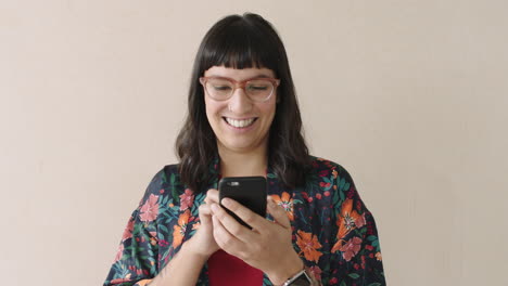 portrait-of-trendy-business-woman-browsing-texting-using-smartphone