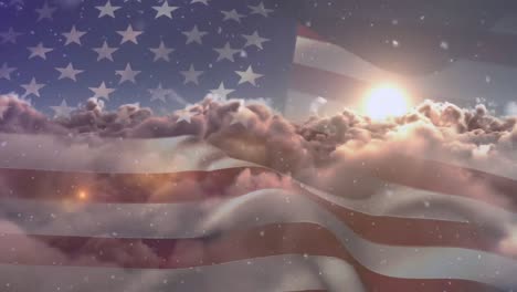 animation of white particles over waving american flag against clouds and sun in the sky