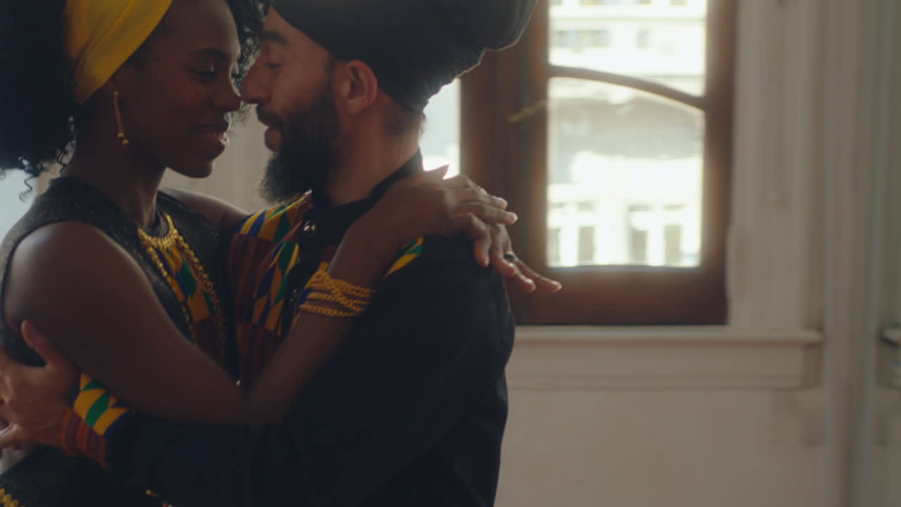 Romantic Couple Dancing Argentine Tango in Studio