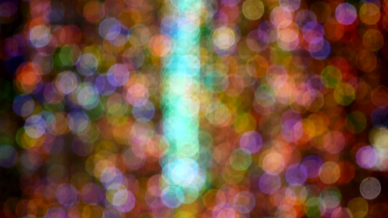 4k 영상 루프에서 추상화 된 다채로운 보케 배경