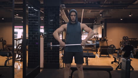 man doing barbell upright row exercise