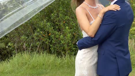 shot of bride - groom with wedding flower