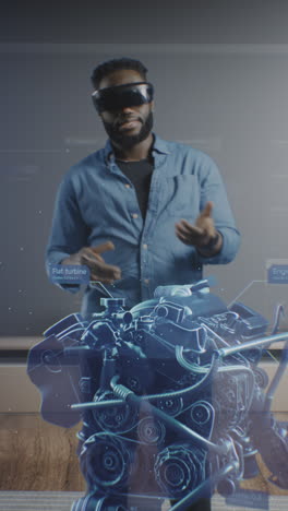 man using vr/ar to visualize and interact with an engine model