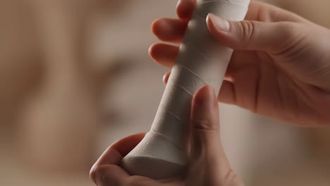 wrapping a tennis racket grip