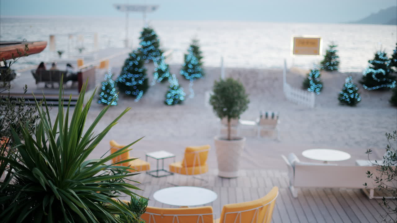 Decorated Christmas trees on a beach at a resort in Cannes, France