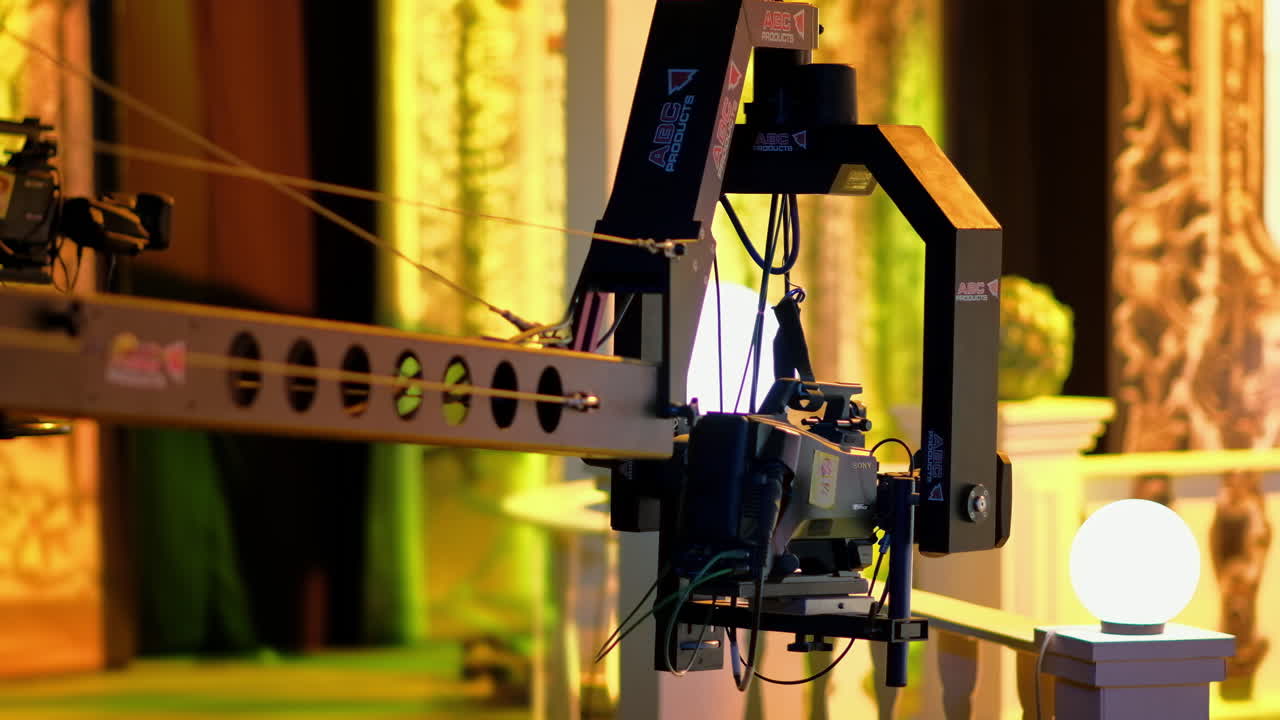 Professional camera filming with on the backstage of a TV set