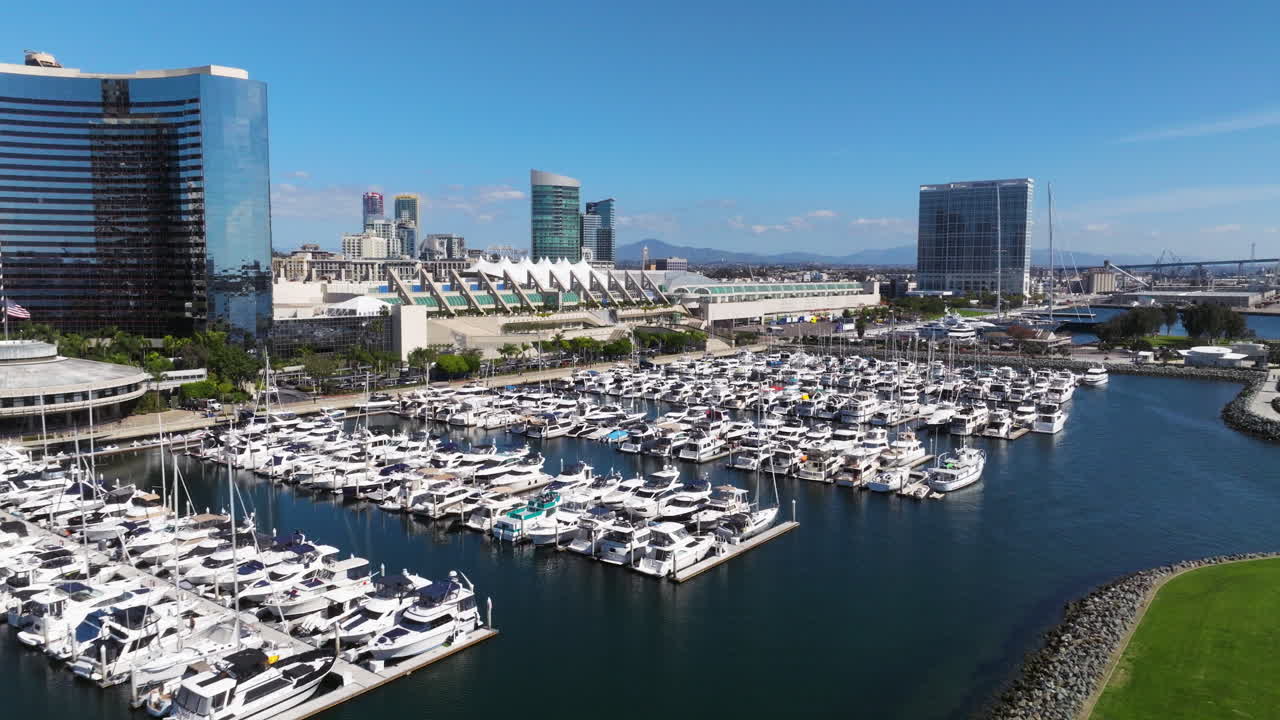 Docked Boats At The Marina In San Diego Bay Skyline In California, United States. Aerial Drone Shot