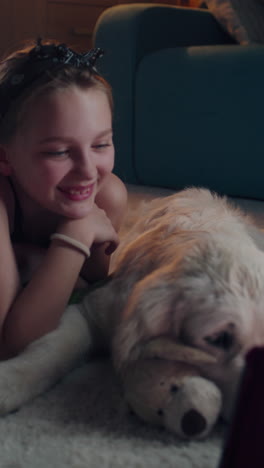 girl and dog relaxing on the sofa