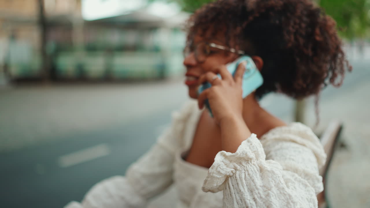 Woman Talking on Her Phone in an Urban Setting