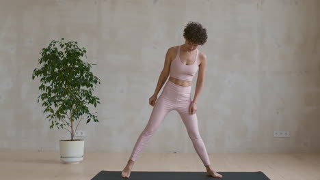 woman practicing yoga poses