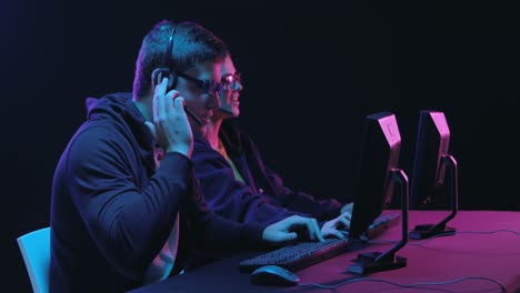 Man-and-woman-working-on-computers