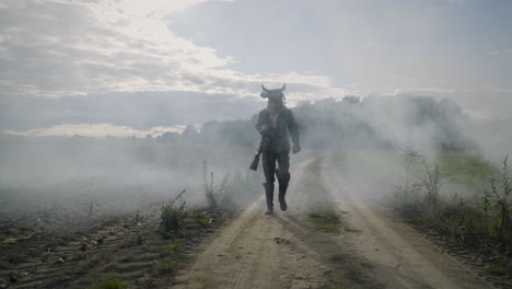 soldier in a bull mask running through fog