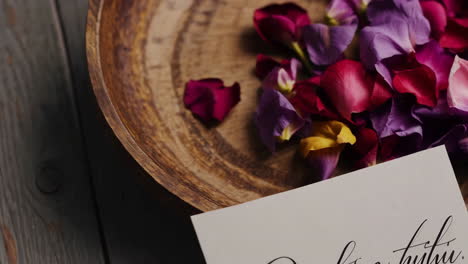 greeting card with rose petals