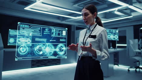 Woman Demonstrates Futuristic Holographic Technology in a Modern Office