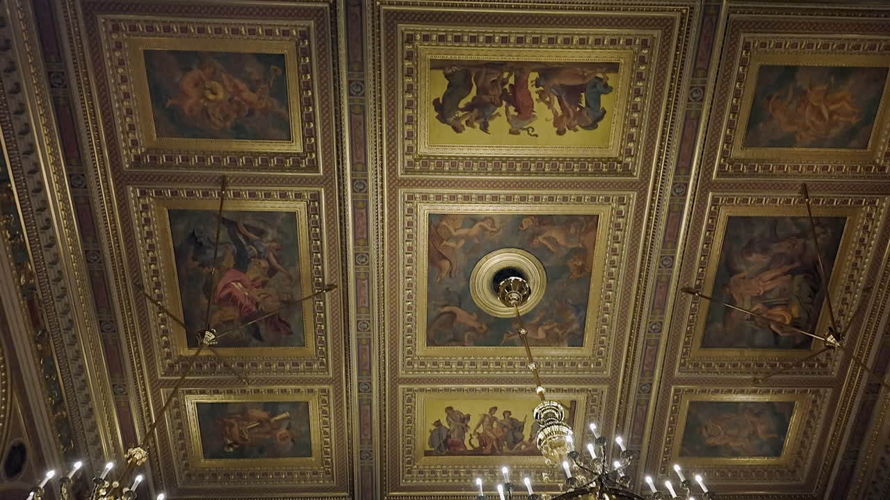 Tilt across ornate gilded art ceiling in Hungarian State Opera House