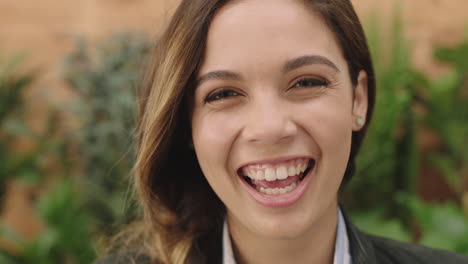 close up young cute hispanic girl portrait of beautiful stylish woman laughing cheerful looking at camera