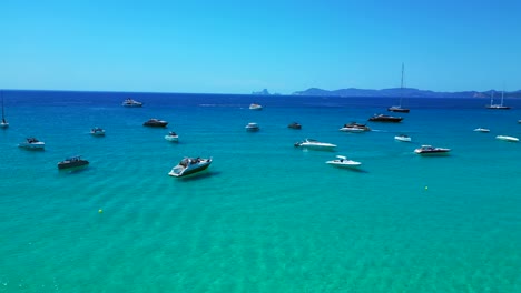 scenic aerial view of rocky island formentera's turquoise azur waters and sandy beaches. wonderful aerial view flight panorama overview drone