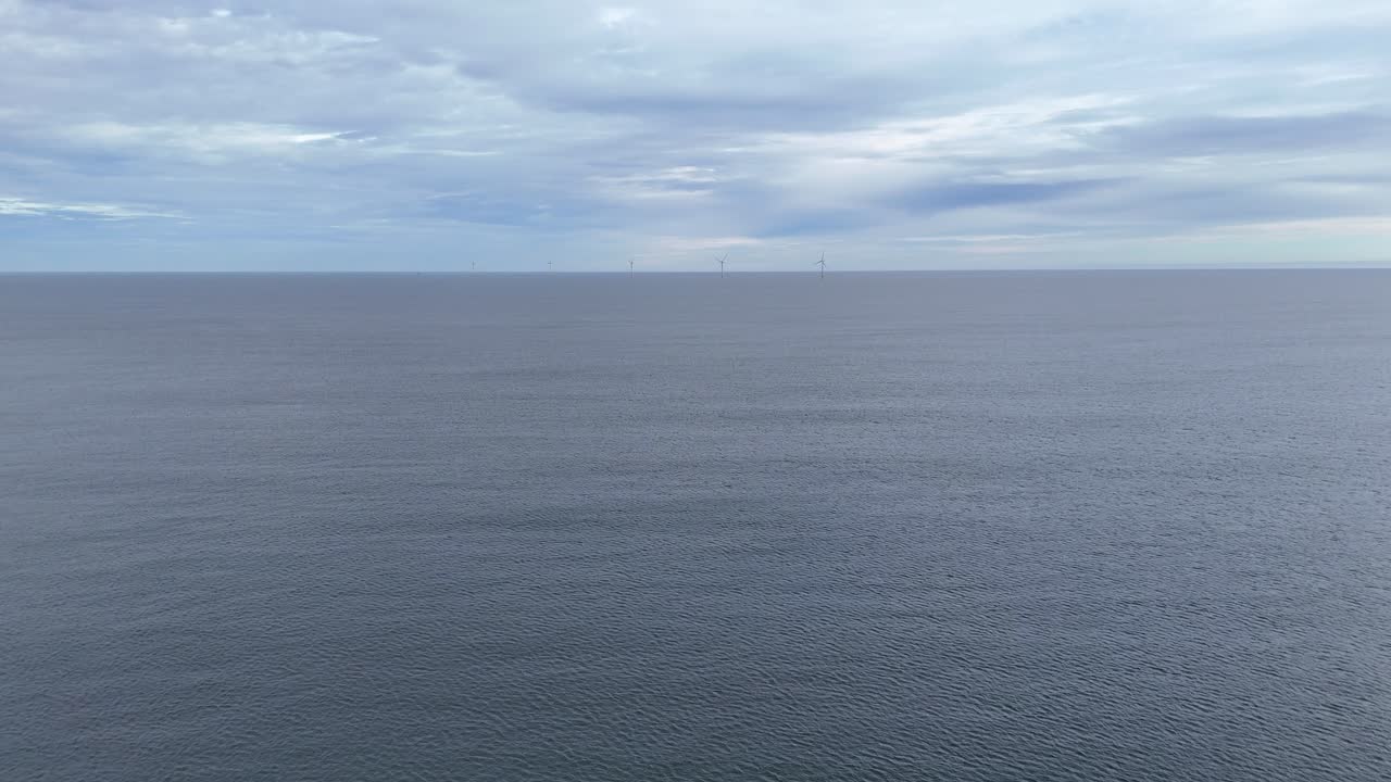 Drone aerial view north sea ocean wind turbine farm eco green energy turbines