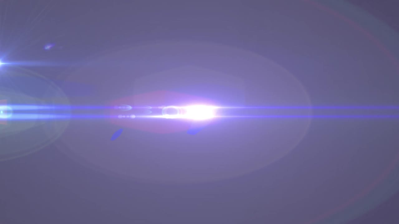 animación del foco con destello de la lente y haces de luz que se mueven sobre un fondo oscuro