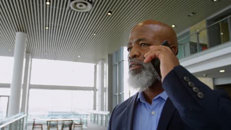 businessman talking on the phone in office 4k