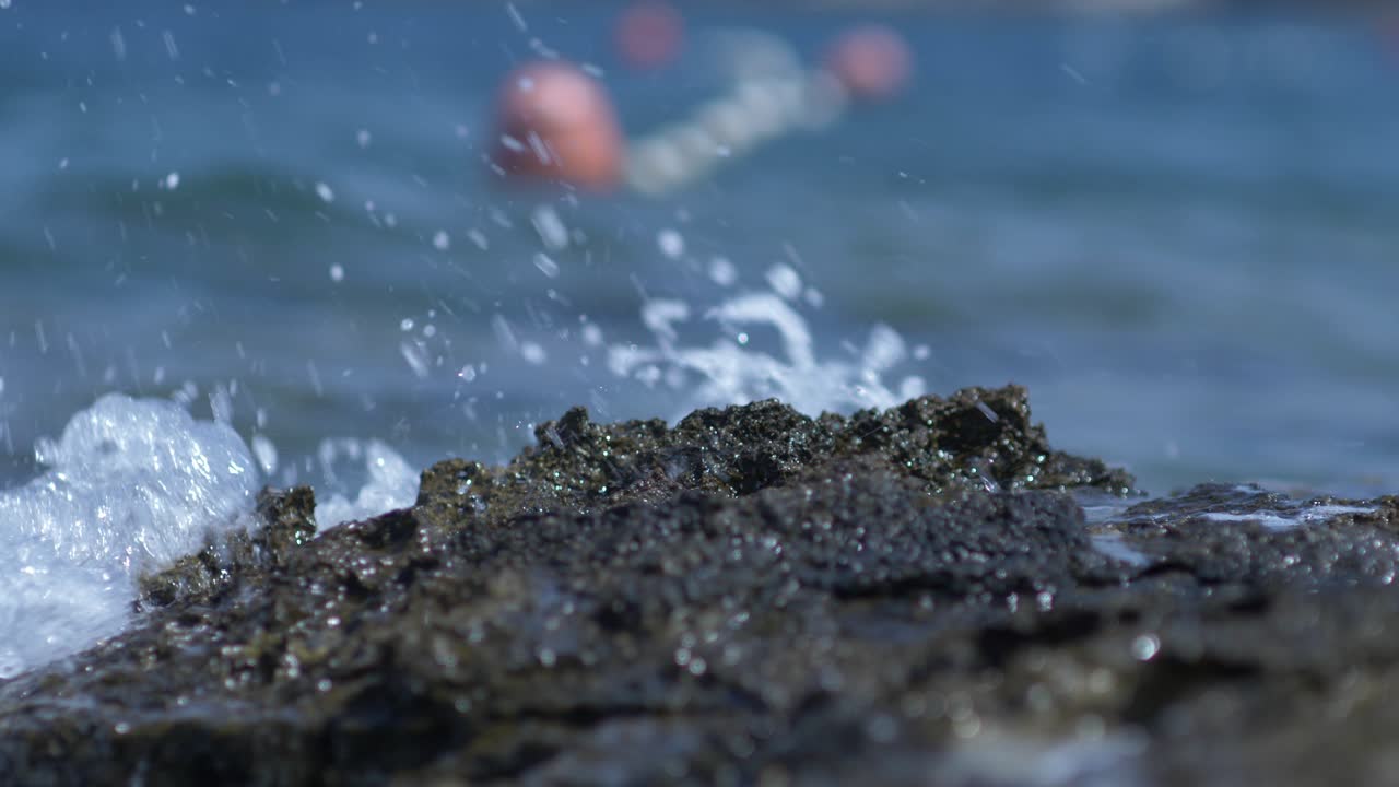 Seascape with rocks and buoy