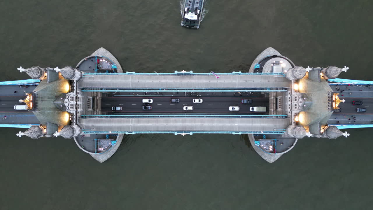 Hyperlapse drone shot above traffic on the Tower bridge, evening in London, UK