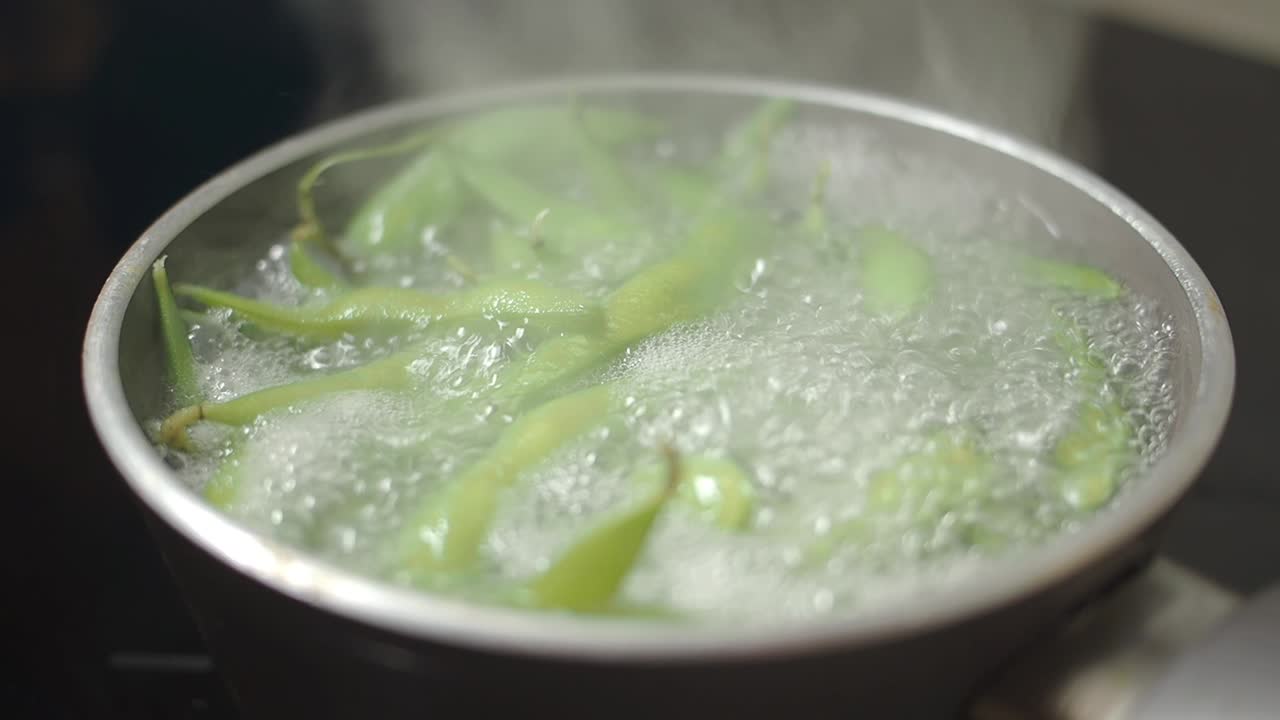 Green Beans Boiling in a Pot with Steam