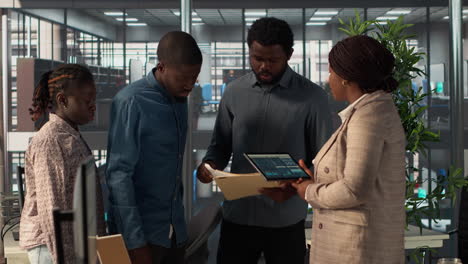 business team discussing data in modern office