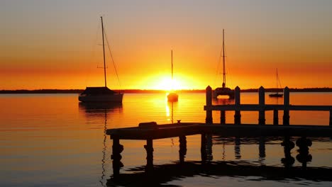 sailing boats and yachts floating on lake macquarie new castle
sunrise sunlight reflection over thje lake