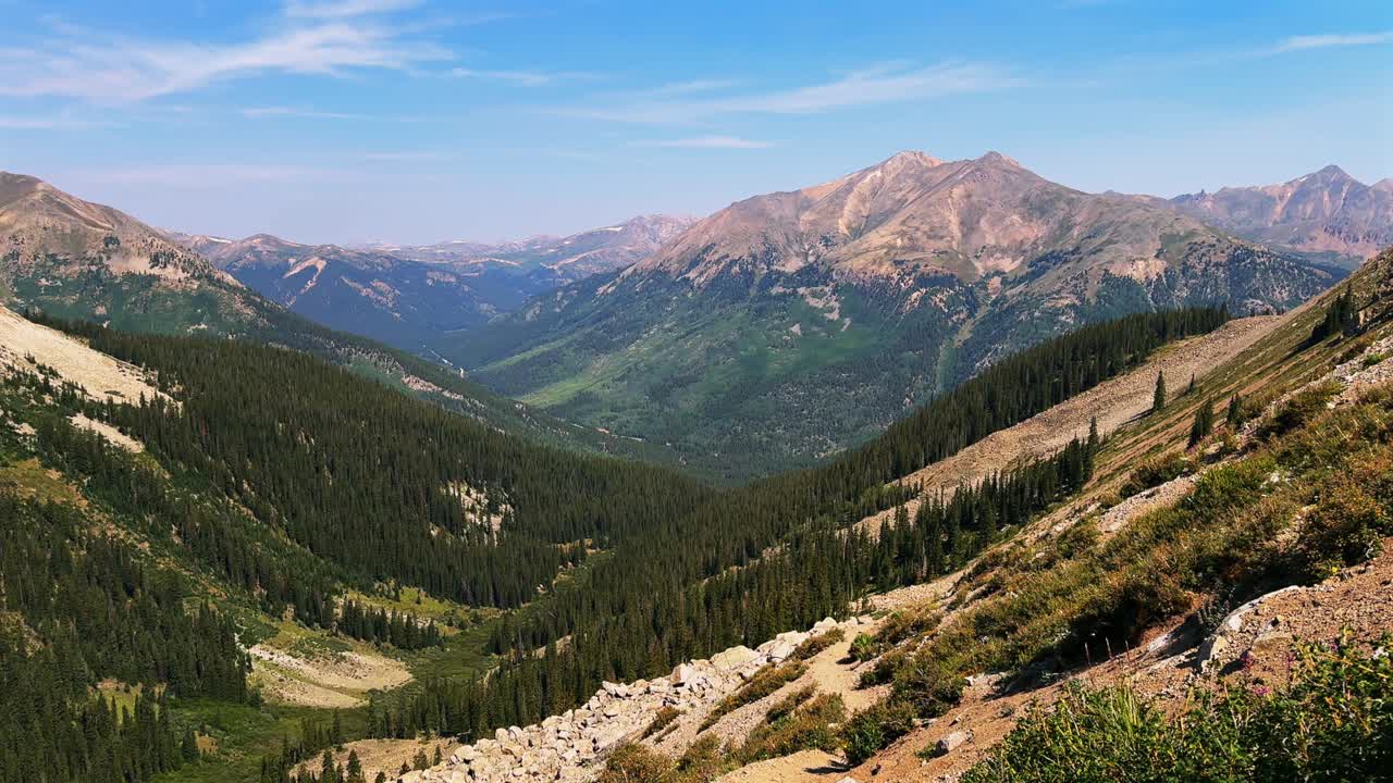 La Plata Peak Gulch Trail 14er view of Independence Pass Sawatch Range 14er spring summer Rocky Mountains Colorado high alpine elevation treeline hiking trails morning blue sky haze static shot