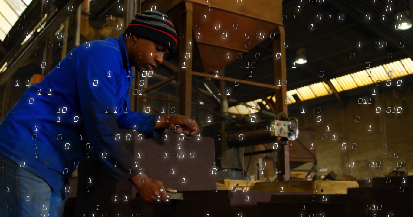 Machinist reaching for metal plate at factory bench, clamping in vise, filing edge amid binary code