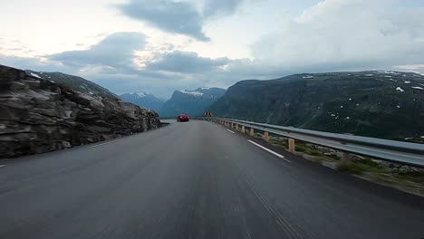 a scenic drive through the norwegian countryside following another vehicle