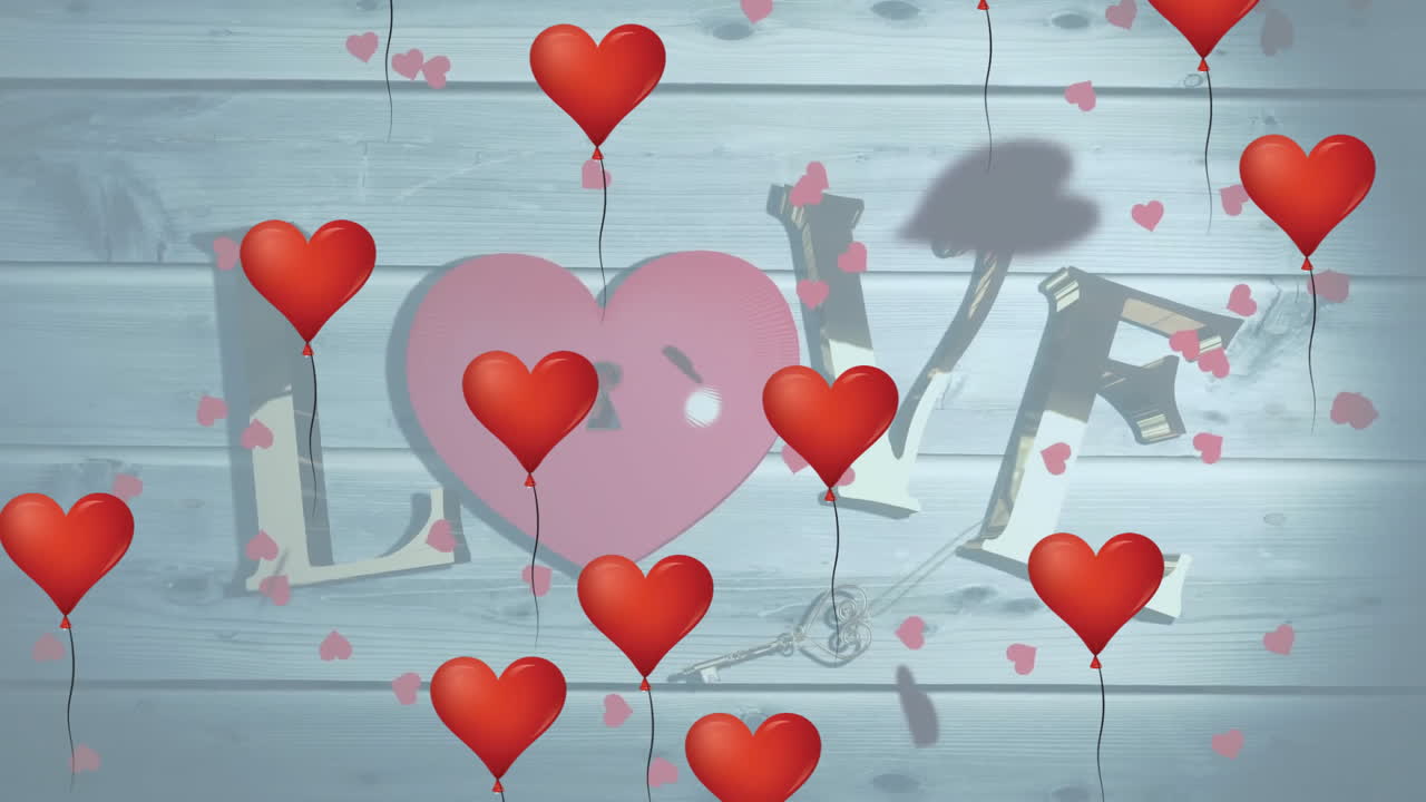 Animation of heart shape balloons over love text