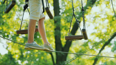 the legs of a tightrope walker overcomes the fear of heights