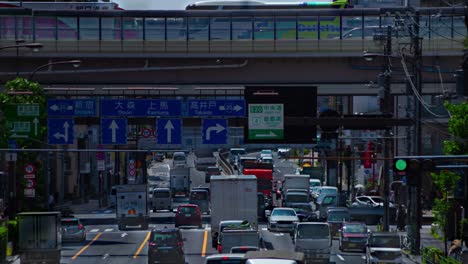 a timelapse of the traffic jam at the urban street in tokyo long shot