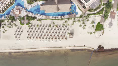 Drone-Flying-Over-Ocean-Beach-Shoreline-Excellence-Riviera-Resort-Cancun