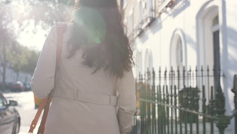 beautiful indian woman walking through city