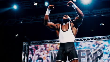wrestler celebrating victory in the ring