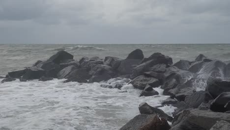 waves crashing rocks on the west coast of denmark