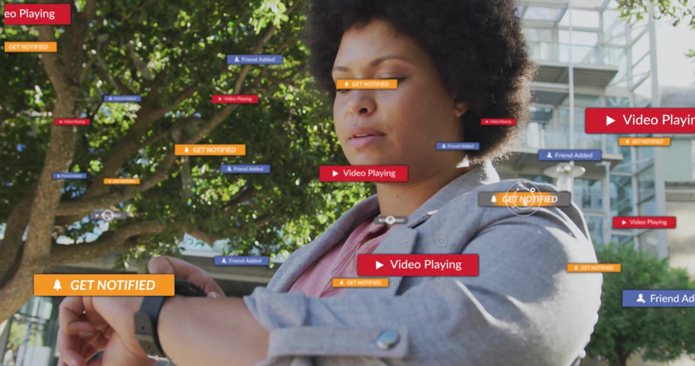 Woman tapping smartwatch face and viewing growing floating notifications while managing tech alerts