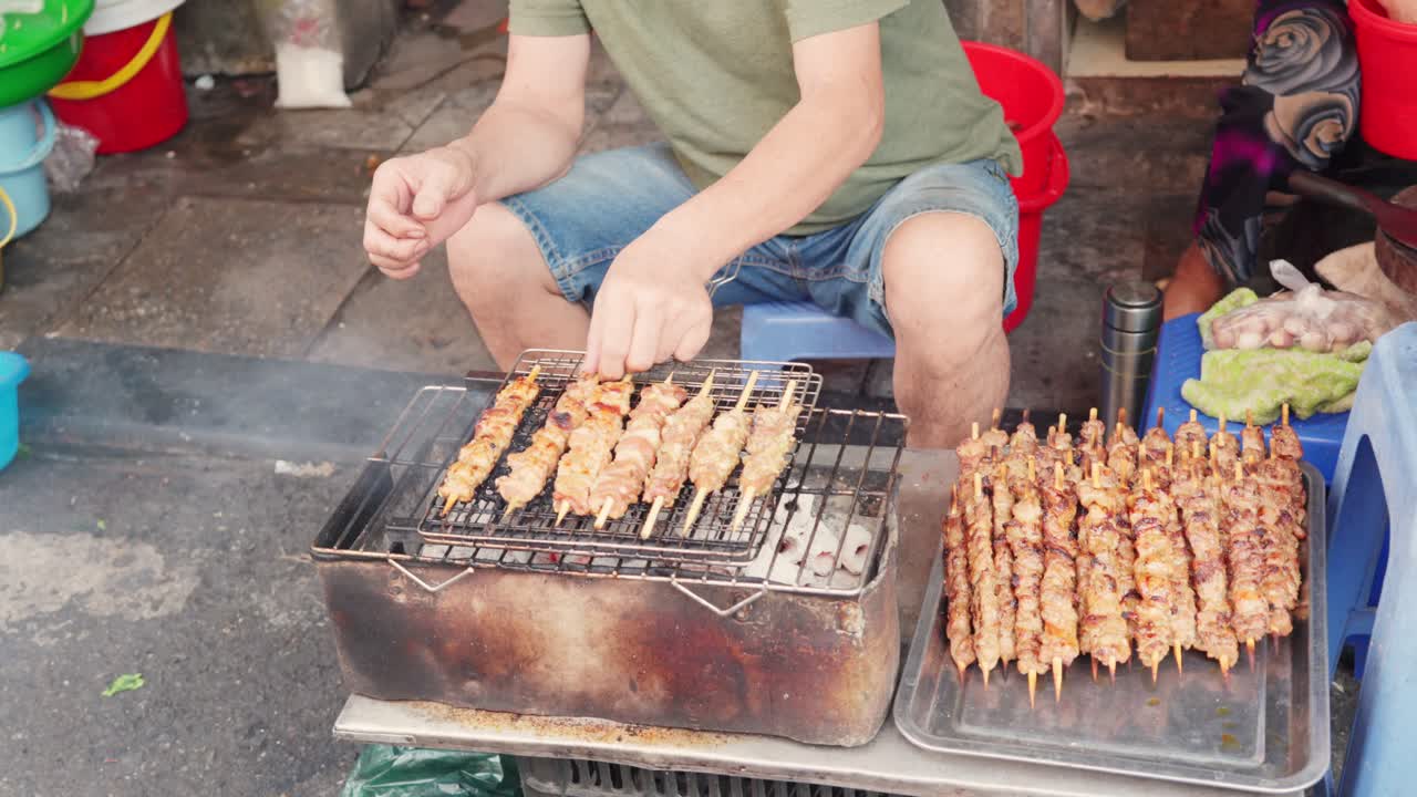 Street food with grilled meat skewers