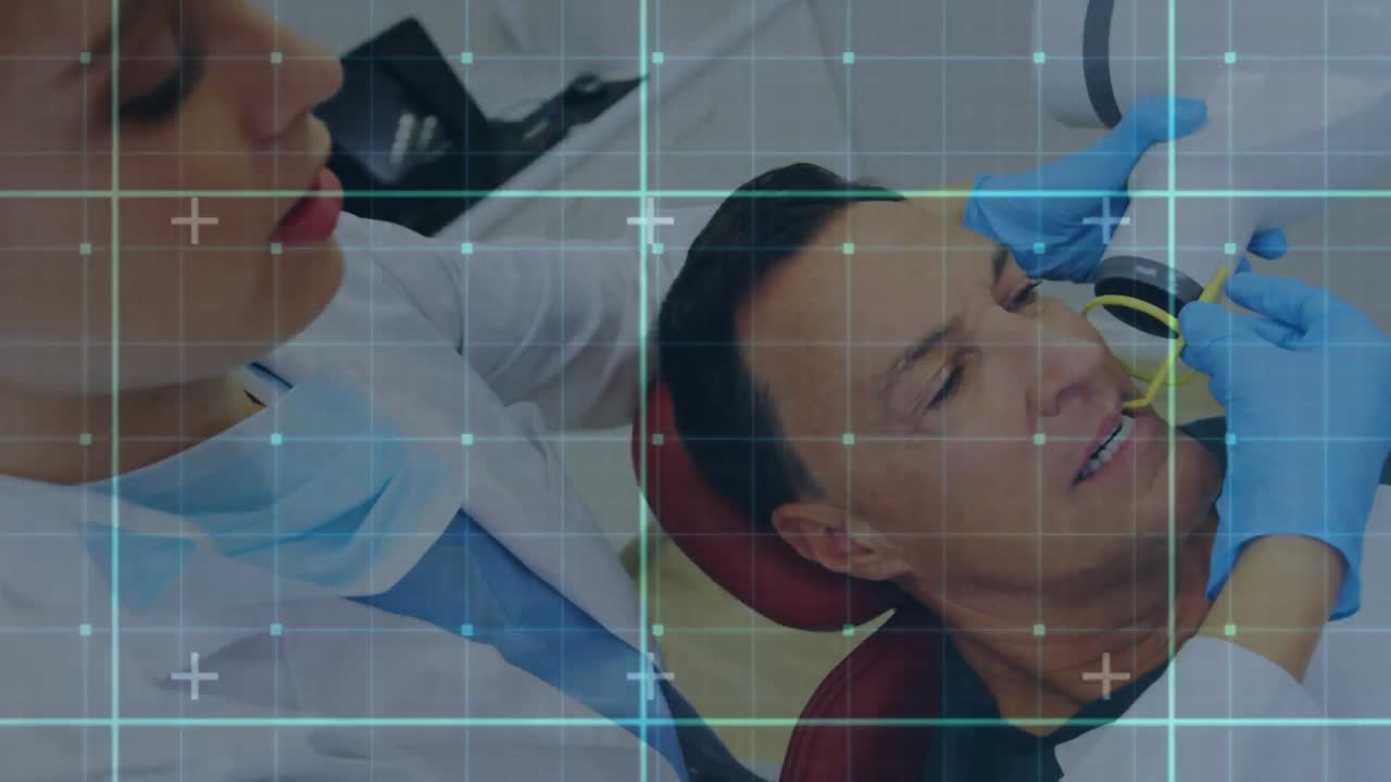 líneas de cuadrícula contra el dentista que trata al paciente masculino