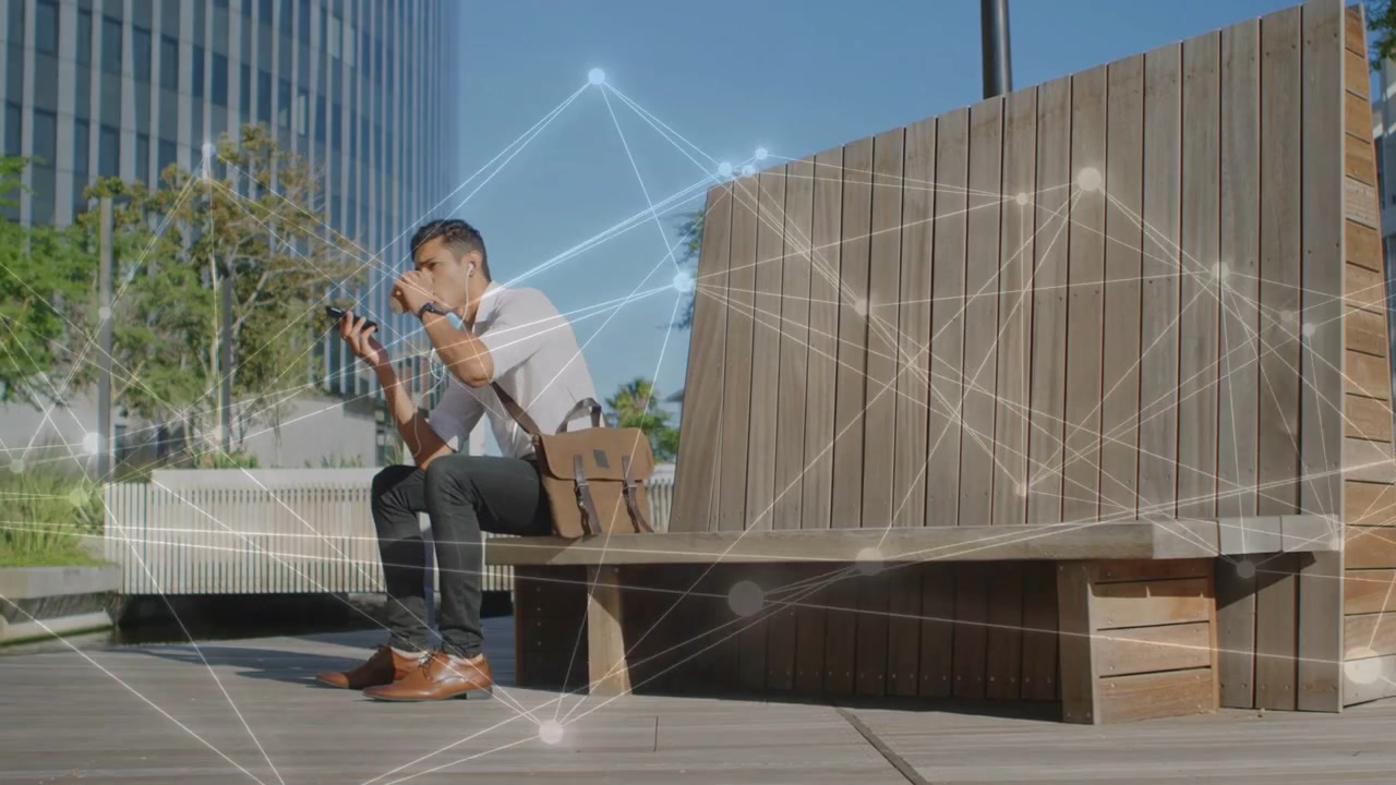 Man tapping phone and adjusting earbud, initiating animated tech nodes circling phone, sipping cup