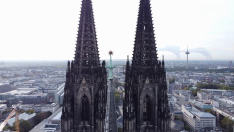 Aerial-pullback-from-Star-of-Bethlehem-on-Cologne-Cathedral-crossing-tower