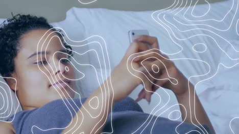 animation of white lines over woman using smartphone