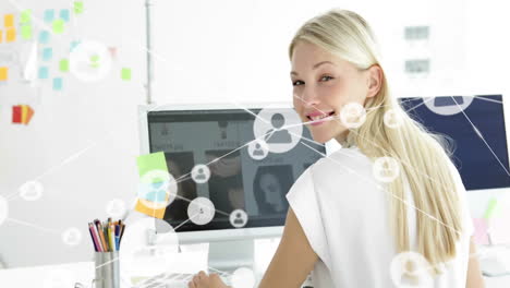 animation of network of connections with people icons over caucasian businesswoman