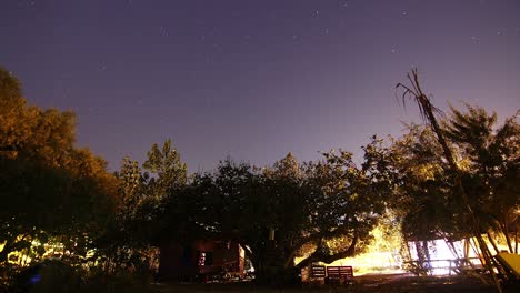 timelapse of moving star trails in night sky.