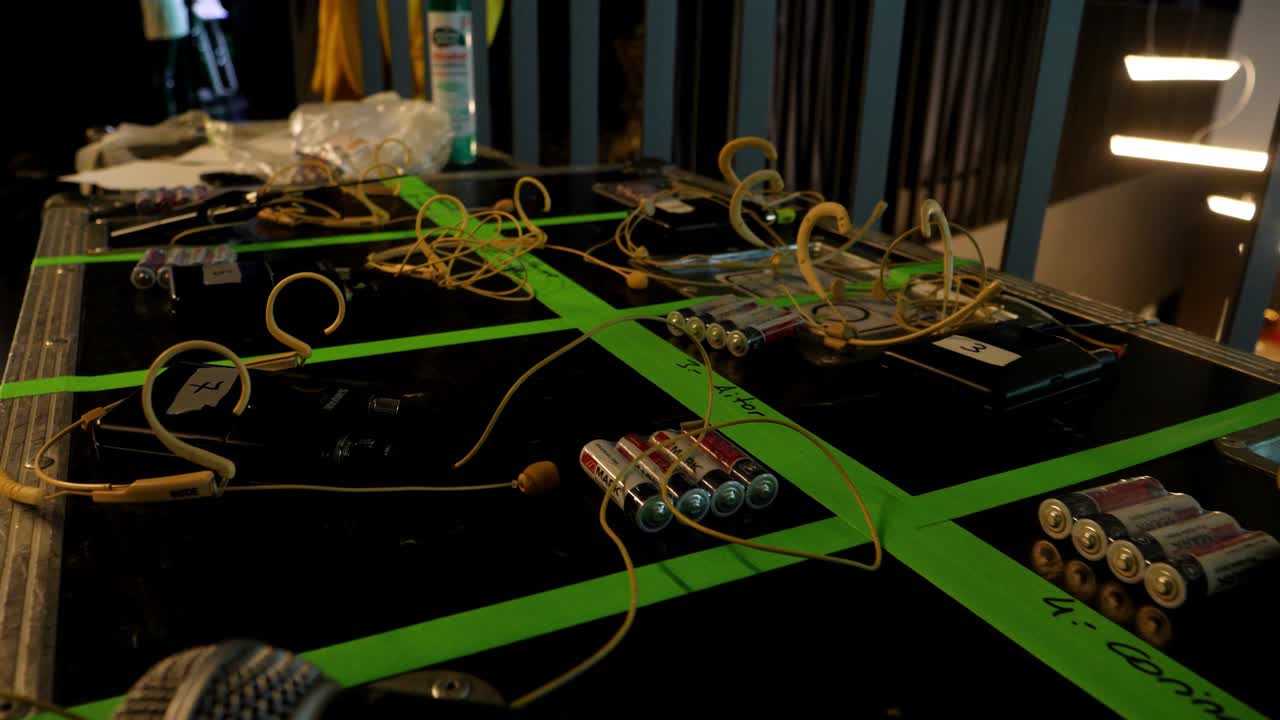 wireless microphones in a backstage ready for use