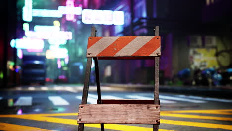 a wooden barricade on a city street at night