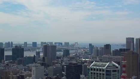 timelapse, the aerial view of the sea and bridge in tokyo